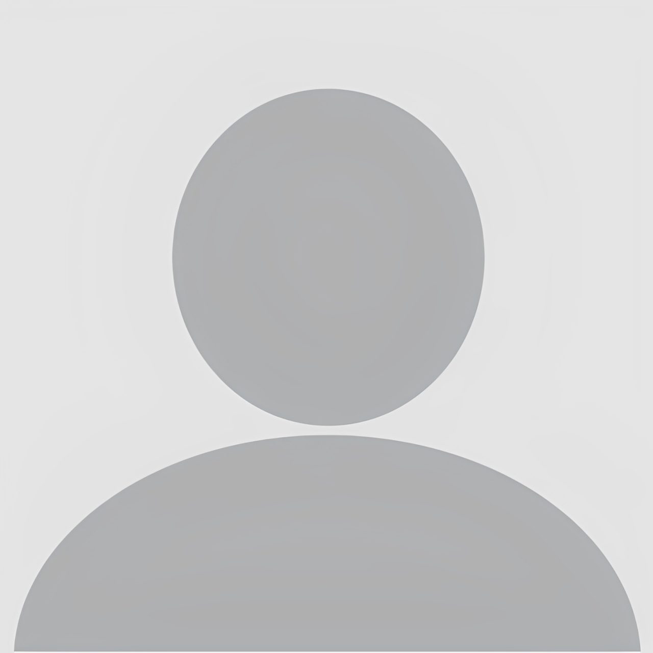 Default user profile silhouette on gray background.